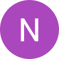 a purple circle with the letter n in it